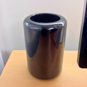 No, not a sleek vase from the Martha Stewart collection. It's the sleek new Mac Pro, made in the USA.